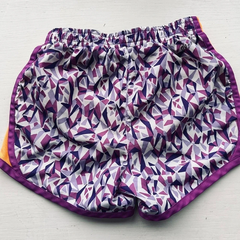 Nike Dri fit girls running shorts size 4 purple/orange
